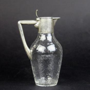 Teekanne mit silberner Fassung Teekanne mit silberner Fassung